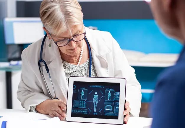 doctor-hold-tablet-with-medical-diagrams